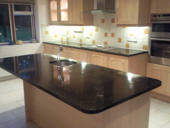 Star Galaxy granite island in Camberley Surrey. Makeover with new tops, sink and tap.