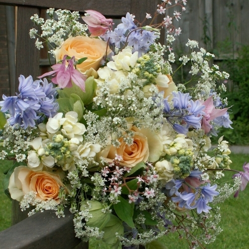 Gorgeous mix of late spring flowers, bluebells, aquilegia, london pride, hellebores and roses.