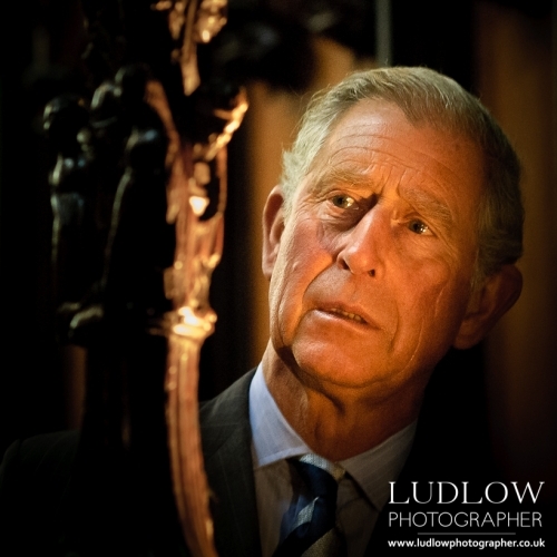 Prince Charles views a carving in St Laurences Church, Ludlow