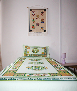 Tibetan lotus coin bed linen or throw 100% cotton