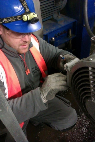 Managing Director Dan, working on a motor