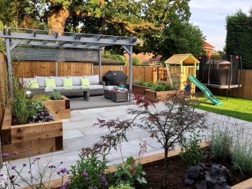 Silver Grey Sandstone Patio with sleepers and pergola