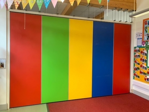 Moving Designs Ltd ~ Acoustic movable wall with vibrant panel faces