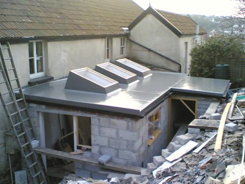 Grp flat roofing with velux skylights